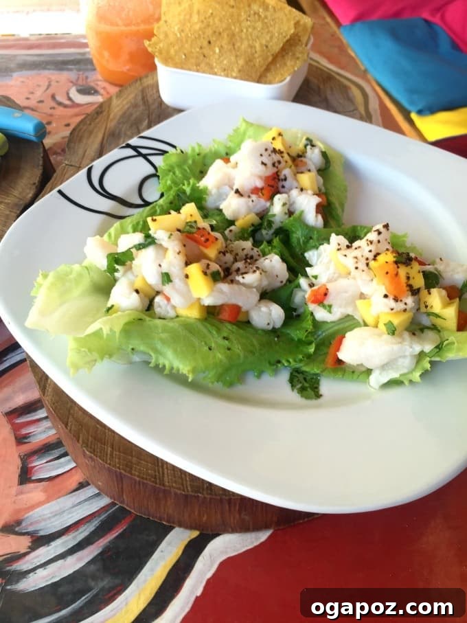 Tamarindo: Costa Rica's Pacific Paradise 17 Delicious Mango Fish Lettuce Tacos served on a wooden board with lime