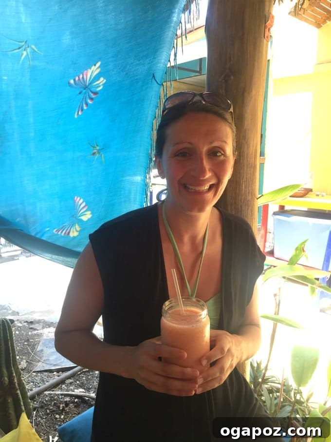 Tamarindo: Costa Rica's Pacific Paradise 19 Smoothie bar counter showcasing fresh fruits like mangoes, pineapples, and bananas