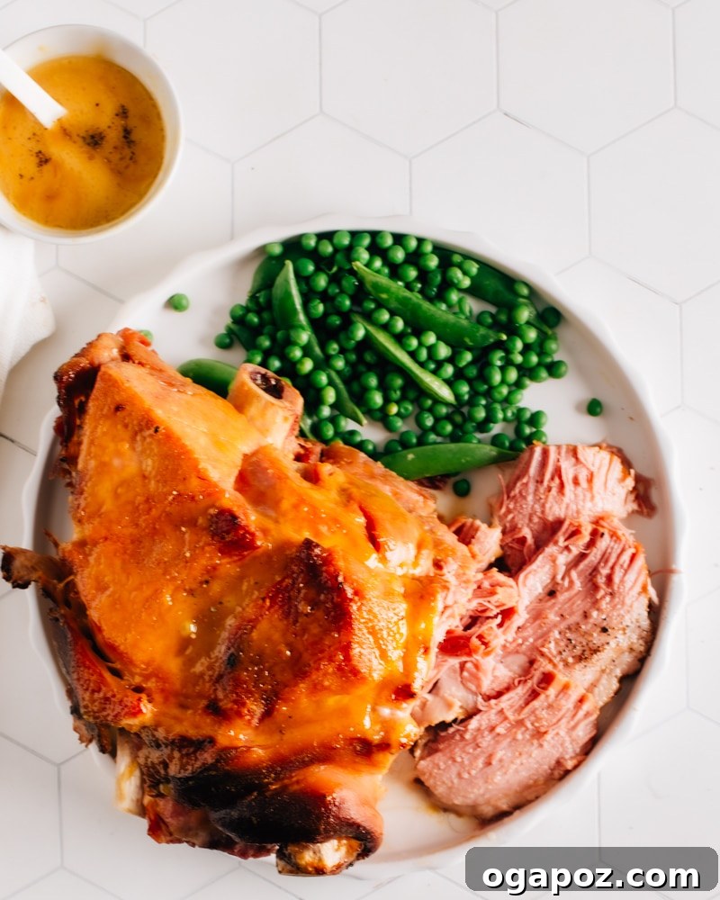 A perfectly cooked ham, sliced and ready to serve, symbolizing the delicious results of pressure cooking.