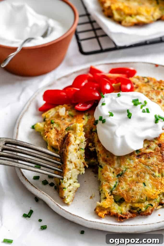 Crispy Zucchini Fritters Made Easy 6 Easy Zucchini Fritters with fork