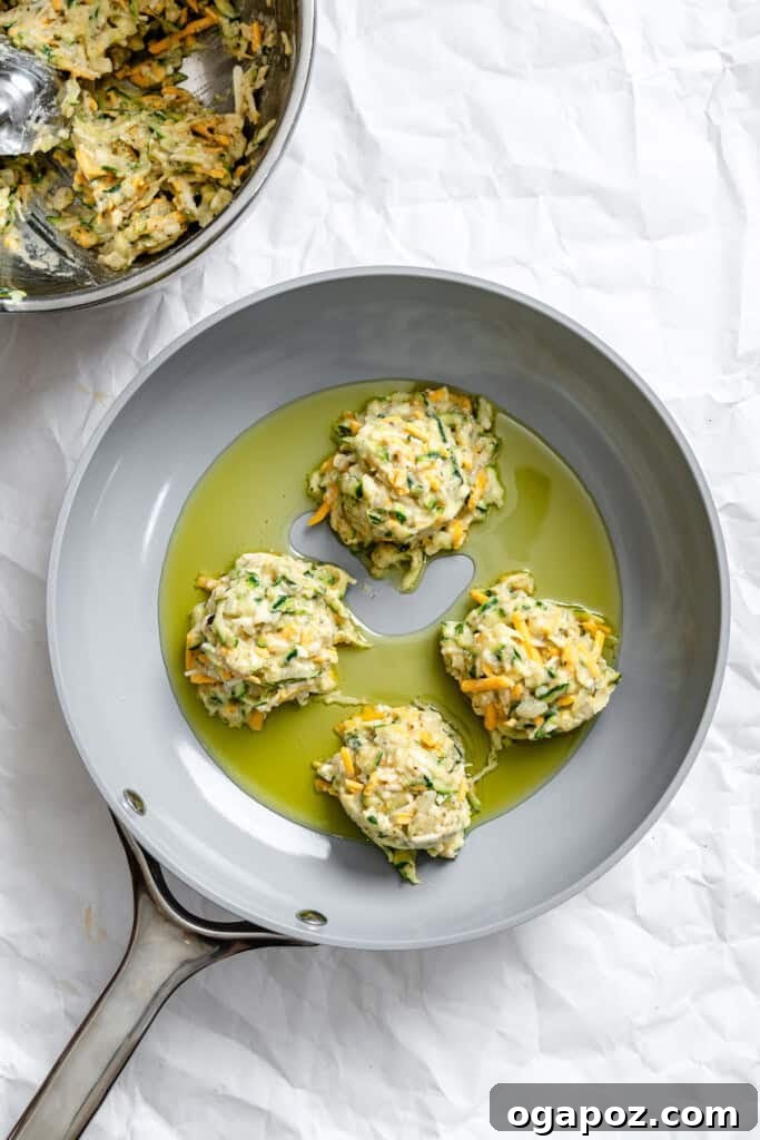 Crispy Zucchini Fritters Made Easy 10 Easy Zucchini Fritters in a pan