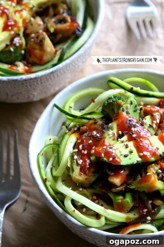 12 Irresistible Zucchini Recipes 4 Vibrant Korean BBQ Zoodle Stir-Fry Bowl with colorful vegetables