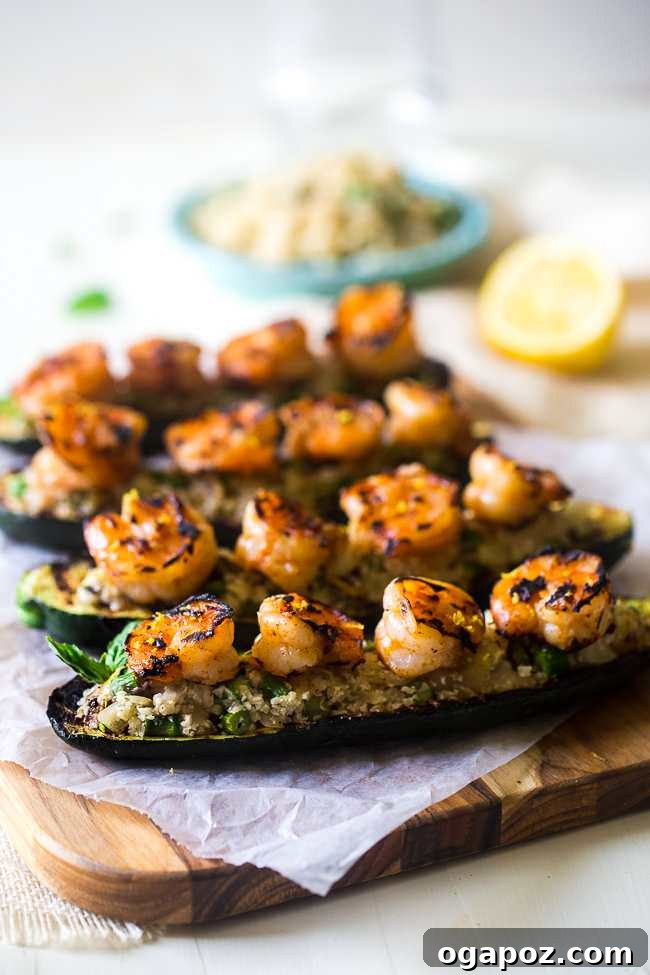 12 Irresistible Zucchini Recipes 6 Grilled zucchini boats stuffed with flavorful cauliflower rice and shrimp