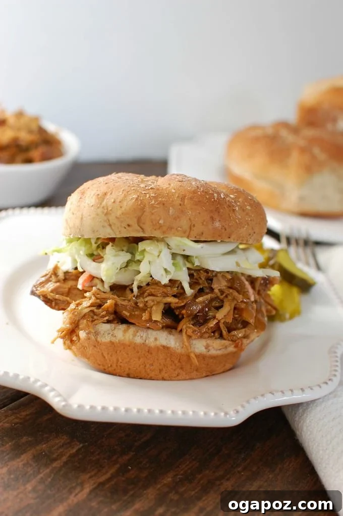 Fall-Apart Tender Slow Cooker BBQ Pulled Chicken Sandwiches 2 Slow Cooker BBQ Pulled Chicken Sandwich - a delicious and easy weeknight meal solution