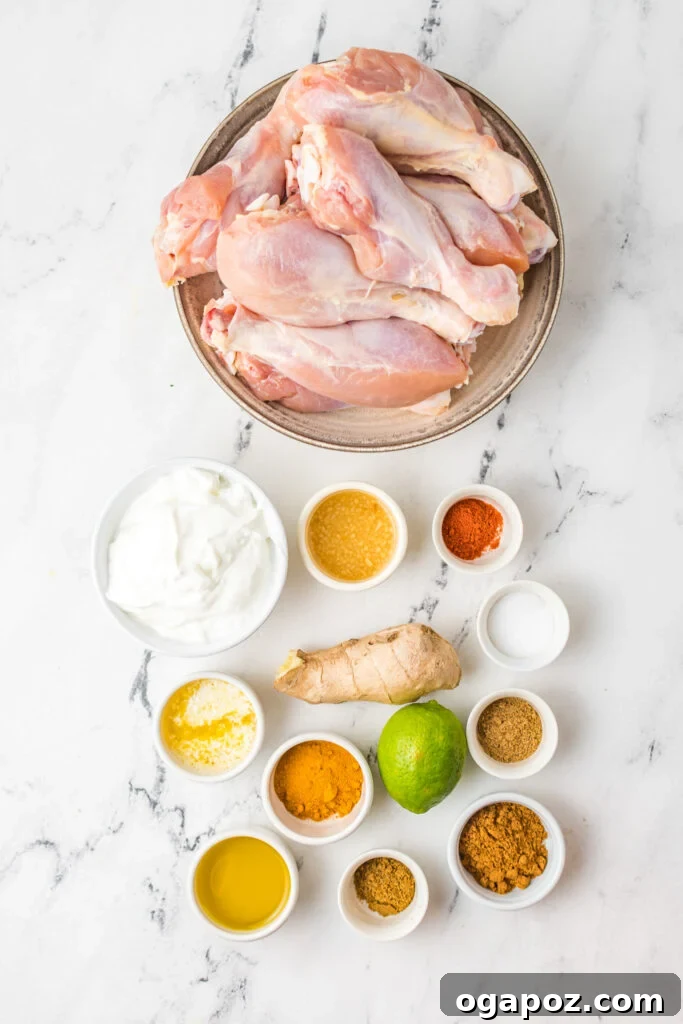 Smoky Tandoori Grilled Chicken 5 A selection of spices, yogurt, lime, and ginger laid out as ingredients for Tandoori chicken.