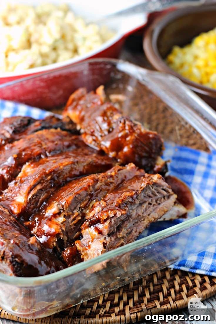 Effortless Slow Cooker Dinners for Busy School Nights 6 Perfectly cooked, fall-off-the-bone slow cooker ribs, coated in a rich BBQ sauce, ready to be devoured.