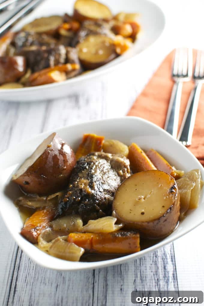 Effortless Slow Cooker Dinners for Busy School Nights 7 Rich and tender red wine slow cooker short ribs with chunky potatoes, carrots, and onions, cooked to perfection.