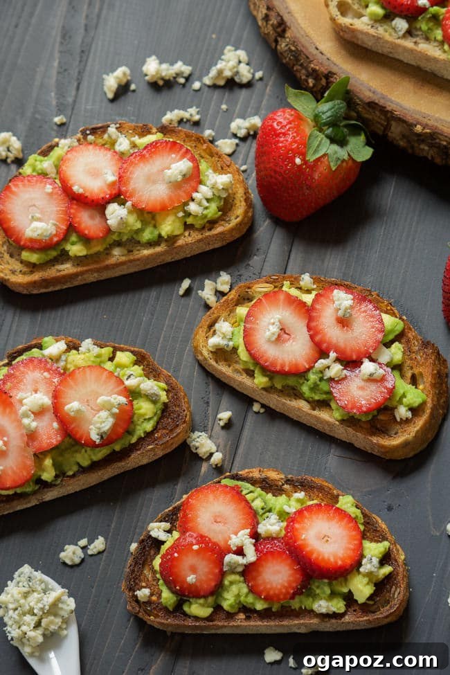 12 Superfood Avocado Recipes 12 Blue Cheese & Strawberry Avocado Toast, a unique and gourmet toast featuring creamy avocado, tangy blue cheese, and sweet strawberries.