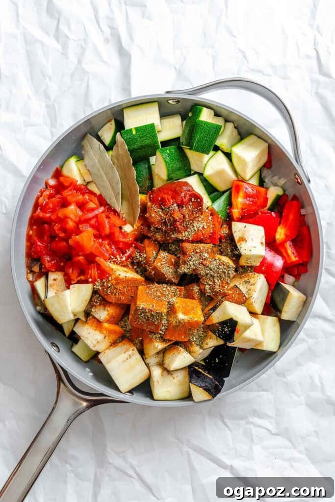 Provencal Garden Pappardelle 8 Freshly chopped vegetables and a medley of aromatic spices gently simmering together in a pan, filling the kitchen with an inviting aroma, for the Ratatouille Pappardelle sauce.