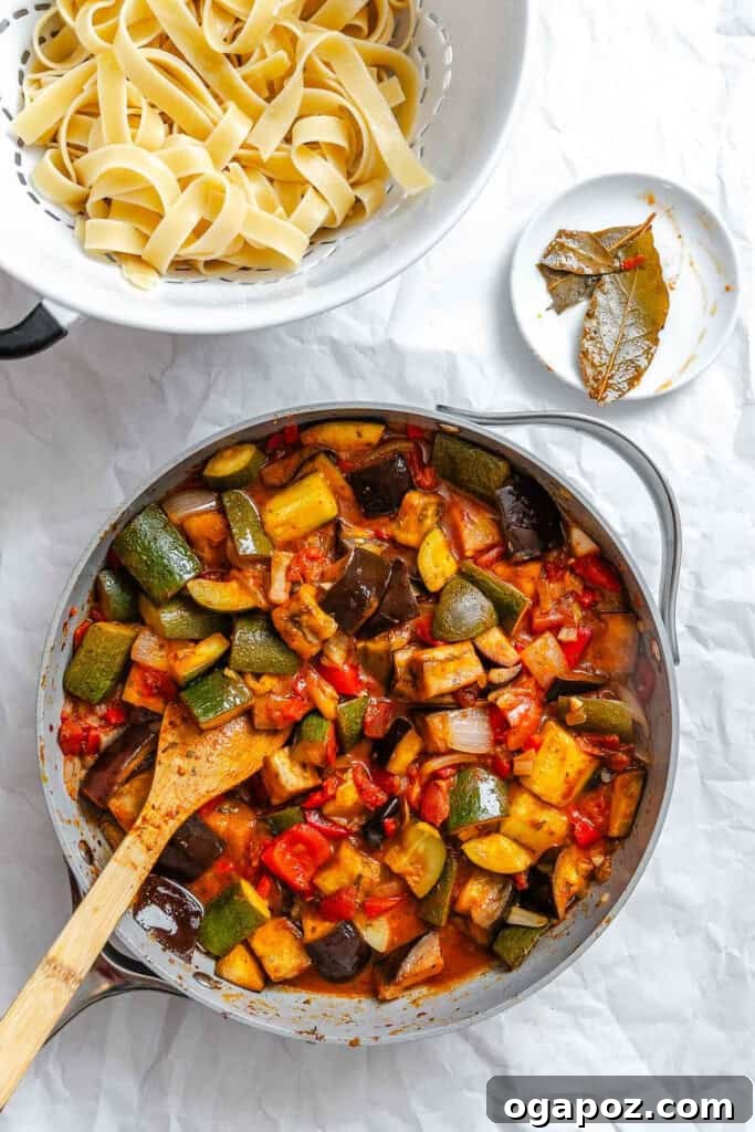 Provencal Garden Pappardelle 9 Ratatouille sauce bubbling gently in a large skillet, with tender vegetables and a rich tomato base, nearly ready to be combined with pasta.