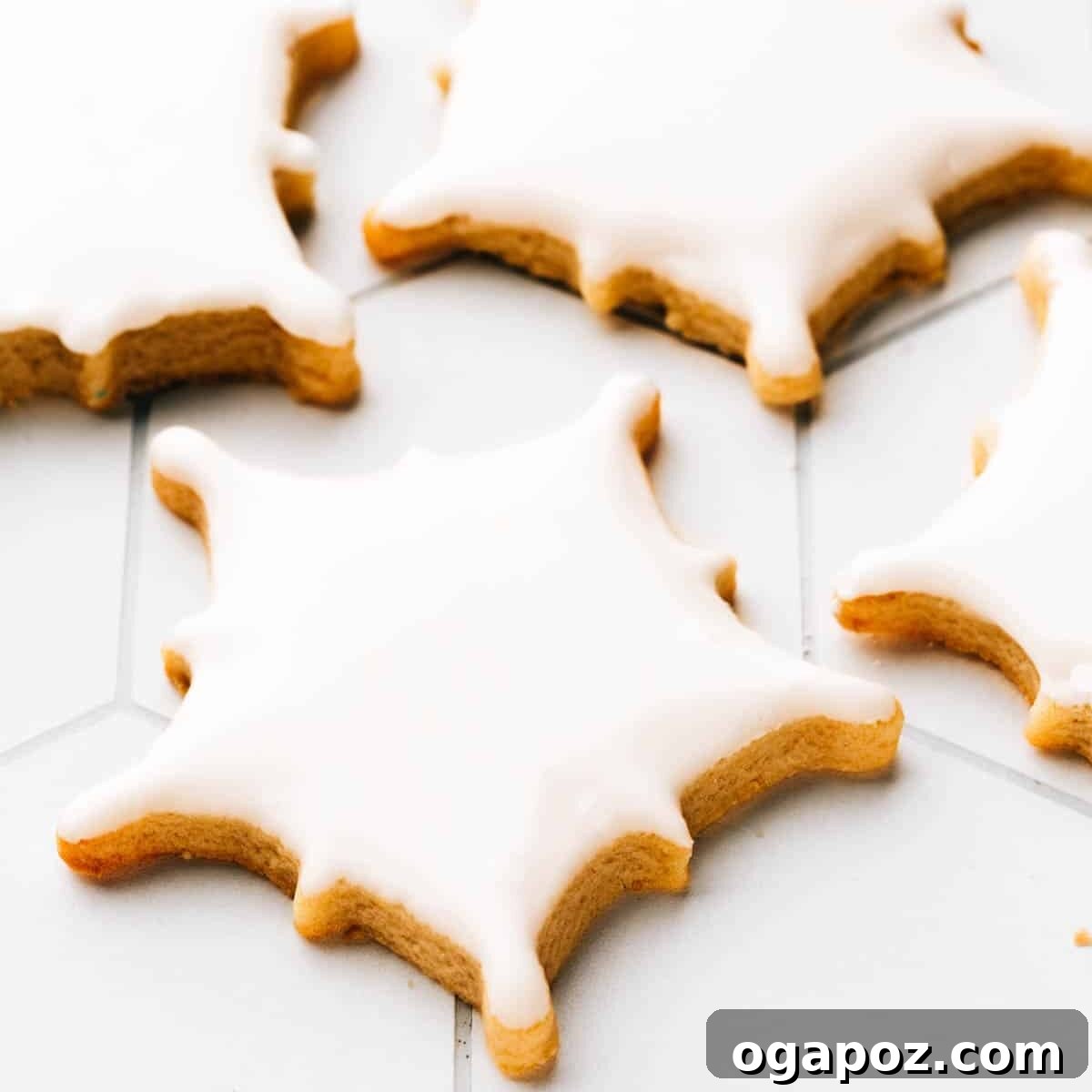 Sugar Snowflakes 8 Snowflake cookies simply decorated with smooth white royal icing and a scattering of sprinkles.