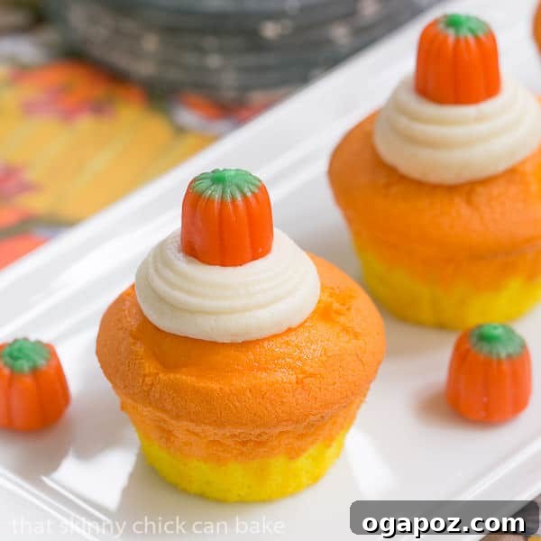 Harvest Stripe Cupcakes 2 Candy Corn Cupcakes - A vibrant layered dessert for Halloween and fall celebrations.