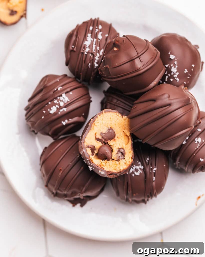 Effortless Chocolate Christmas Delights 14 Delicious Cookie Dough Bites coated in chocolate, perfect for holiday gifting or dessert trays.