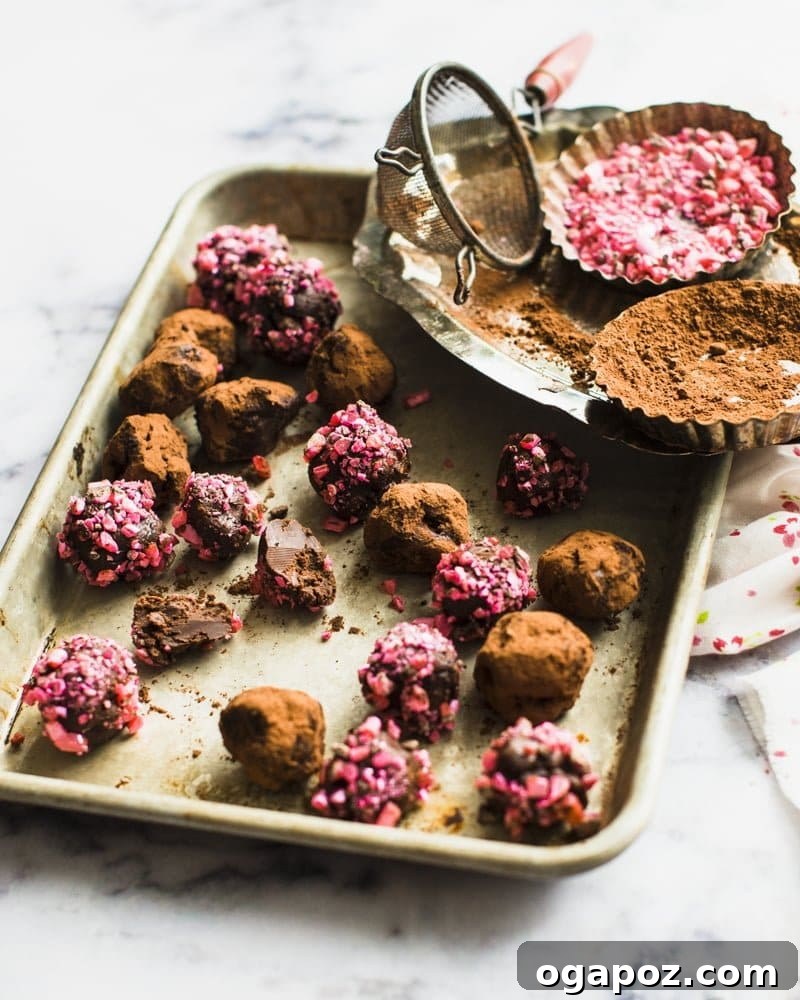 Effortless Chocolate Christmas Delights 15 Decadent 3-Ingredient Chocolate Truffles, beautifully decorated with crushed mint candies for a festive touch.