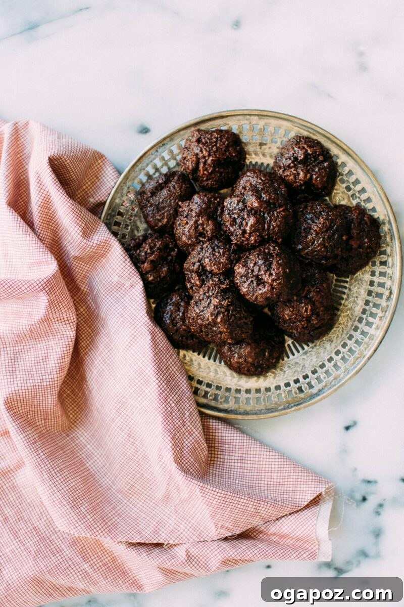 Effortless Chocolate Christmas Delights 10 Chewy Double Chocolate Coconut Cookies, also known as Macaroons, showcasing their rich texture and coconut flakes.