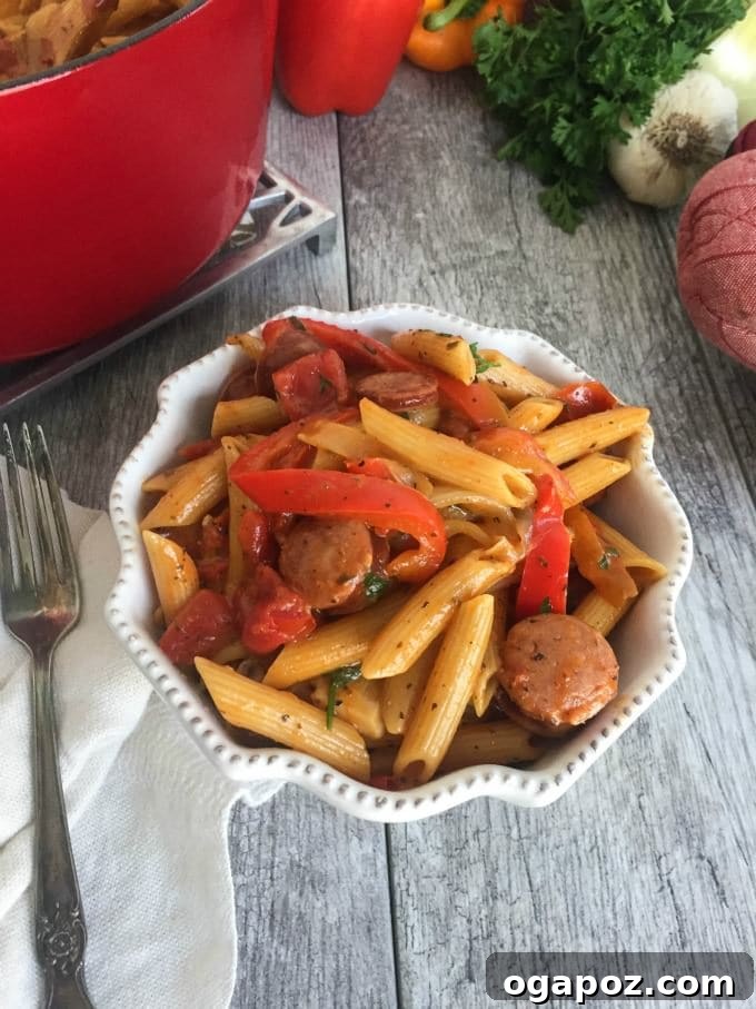 Close-up of One Pot Cajun Pasta showing creamy sauce, sausage, and vegetables