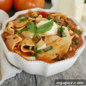 Lazy Lasagna Soup with Turkey and Kale 5 A vibrant and comforting bowl of Slow Cooker Turkey Kale Lasagna Soup.