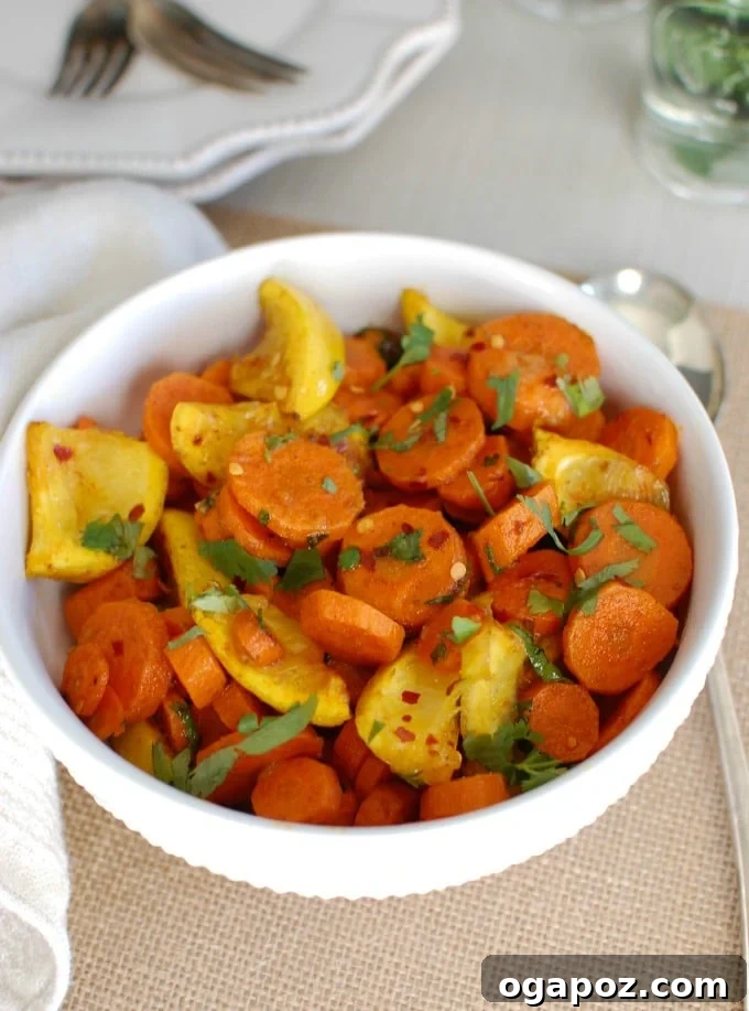 Sun-Kissed Moroccan Roasted Carrots 4 Moroccan Roasted Carrots on a baking sheet.