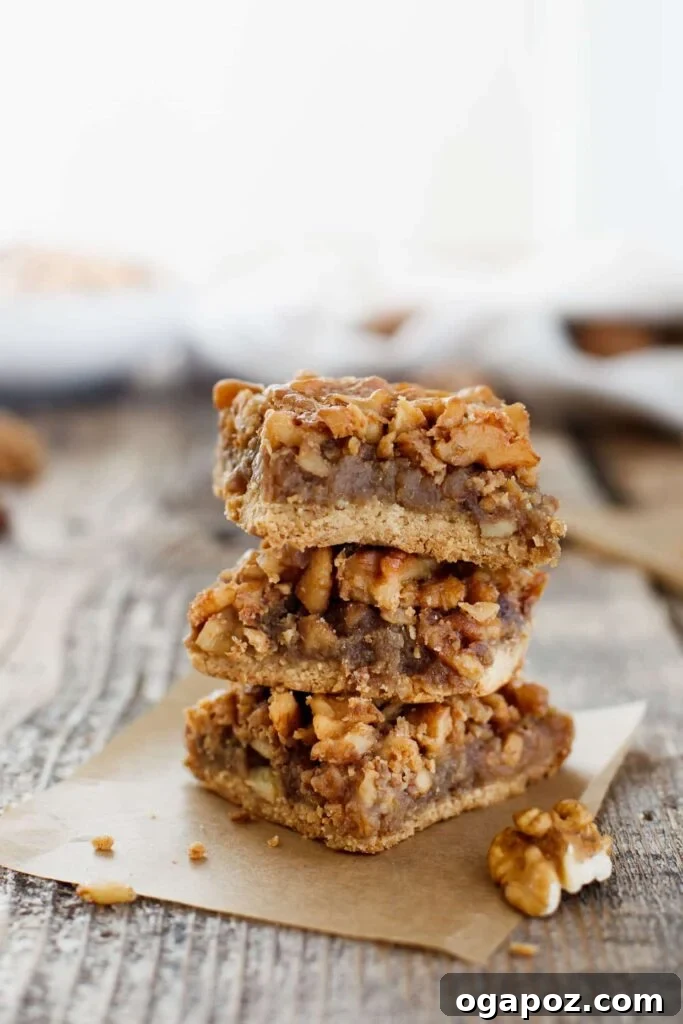 Thanksgiving's Sweetest Sixteen: Irresistible Dessert Ideas 11 Delicious Maple Walnut Bars – a gluten-free fall dessert with crunchy walnuts and sweet maple syrup.
