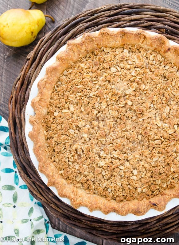 Thanksgiving's Sweetest Sixteen: Irresistible Dessert Ideas 12 Rustic Pear Ginger Crumble Pie – a comforting fall pie with warm spices and a sweet crumble topping.