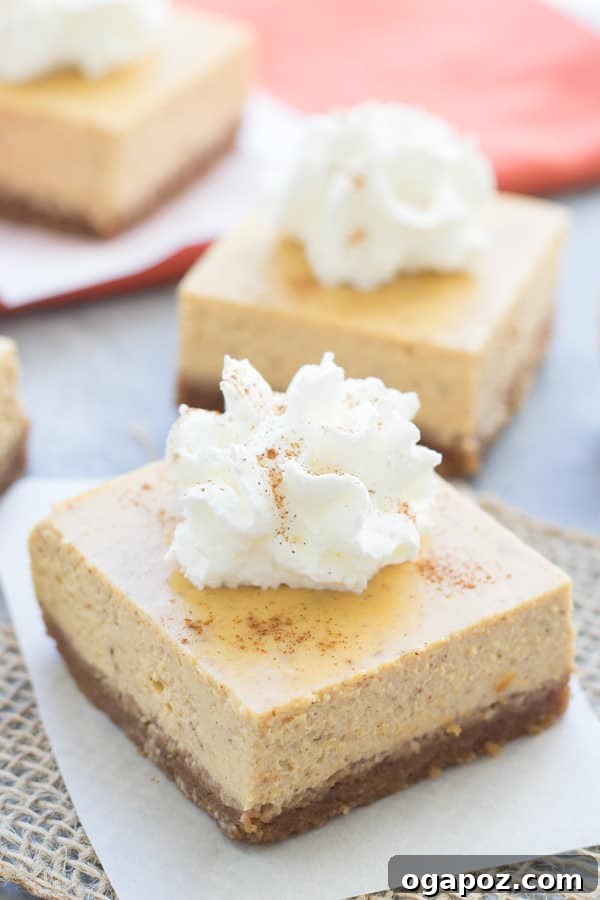 Thanksgiving's Sweetest Sixteen: Irresistible Dessert Ideas 14 Light and creamy Pumpkin Greek Yogurt Cheesecake Bars – a healthier twist on a classic Thanksgiving dessert.