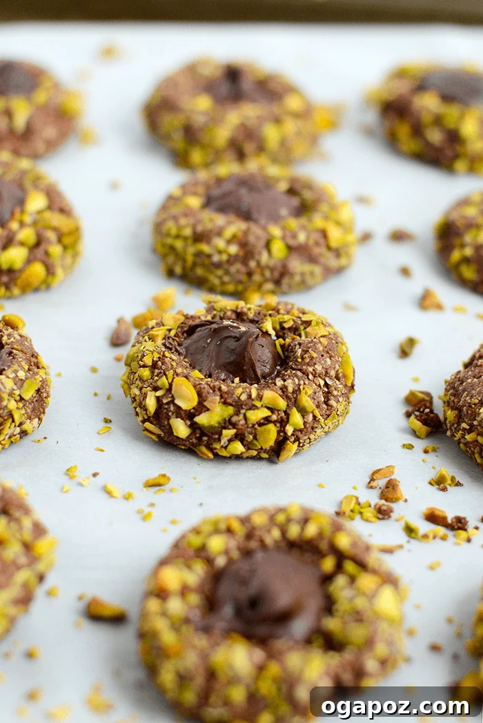 Thanksgiving's Sweetest Sixteen: Irresistible Dessert Ideas 16 Healthy Thumbprint Cookies with Chocolate and Pistachio – a guilt-free sweet treat for Thanksgiving.