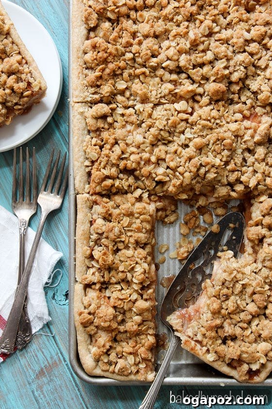 Thanksgiving's Sweetest Sixteen: Irresistible Dessert Ideas 9 Classic Apple Crumb Slab Pie – a rustic and delicious apple dessert, ideal for feeding a crowd at Thanksgiving.
