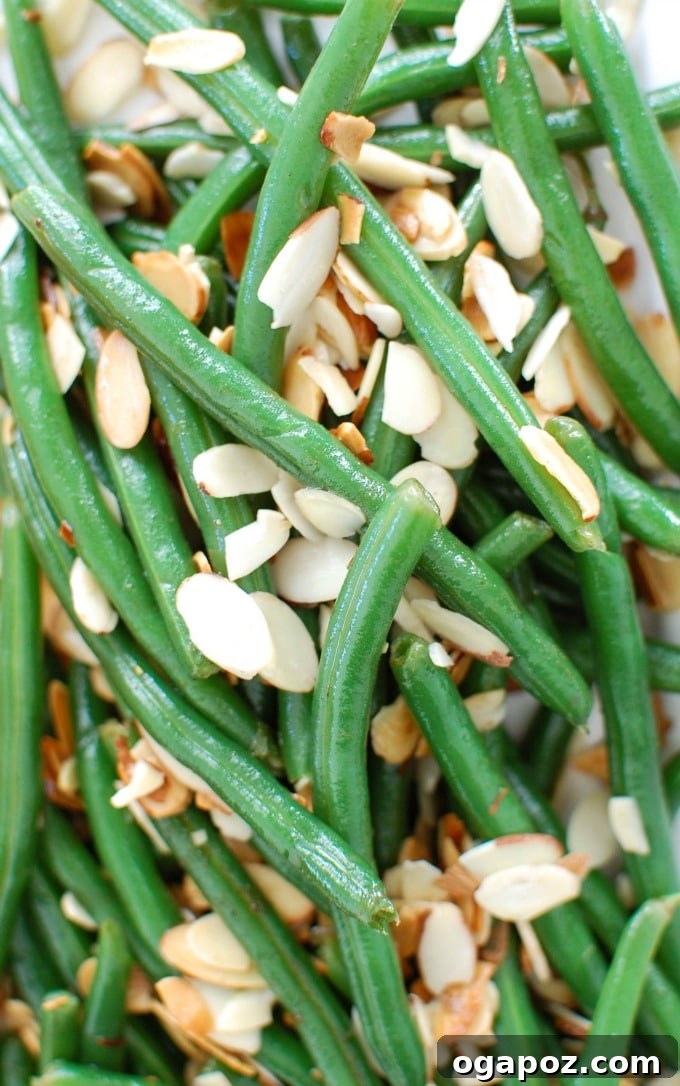 Golden Brown Butter Green Beans with Toasted Almonds 5 A close-up of healthy and delicious Green Beans with Brown Butter and Toasted Almonds, highlighting texture and color.
