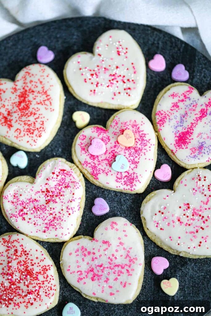 Sweetheart Sugar Cookies Effortless Valentine's Delights 12 Valentine sugar cookies decorated with sprinkles and hearts