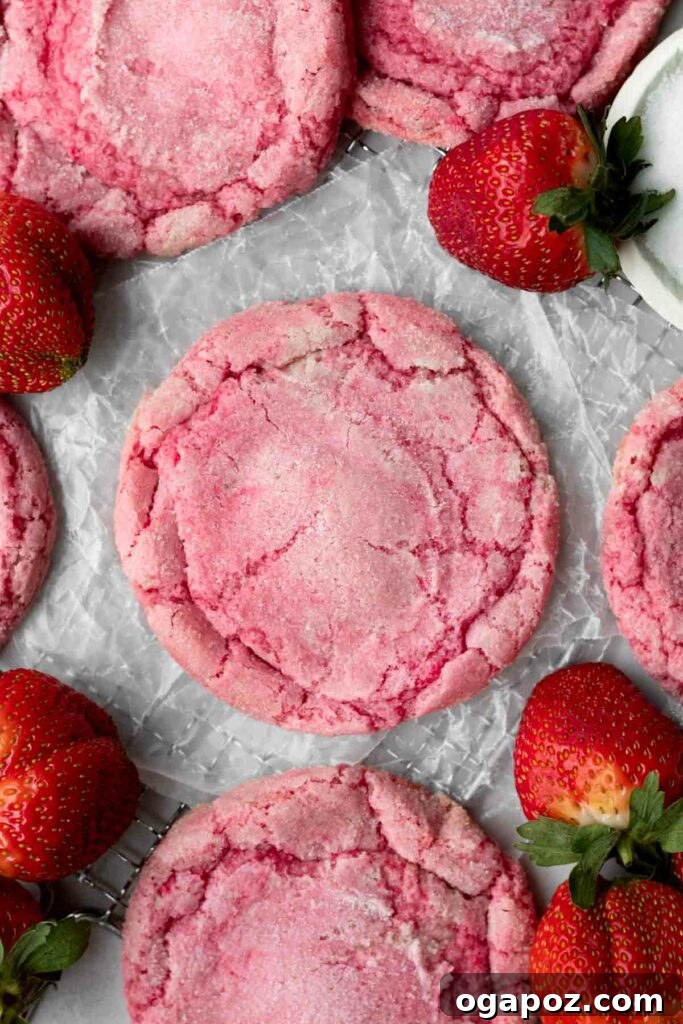 Sweetheart Sugar Cookies Effortless Valentine's Delights 3 strawberry sugar cookies surrounded by fresh strawberries