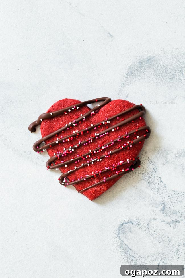 Sweetheart Sugar Cookies Effortless Valentine's Delights 8 heart shaped red velvet cookie drizzled with melted chocolate