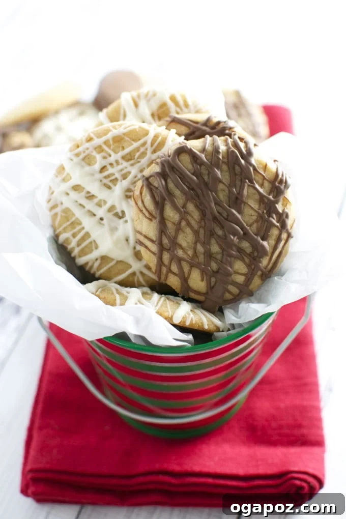 23 Essential Holiday Cookies to Bake This Season 7 Elegant mini chocolate drizzle cookies, perfectly sized for delicate enjoyment and festive presentation.