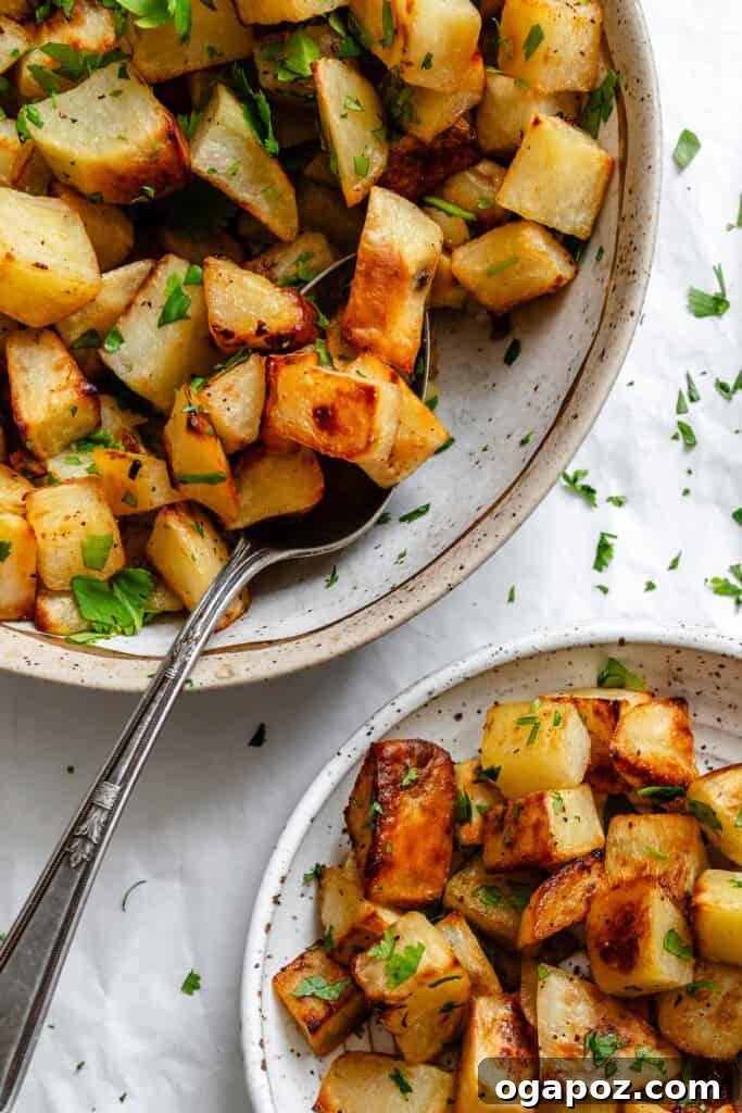 Bright Lemon & Cilantro Roasted Potatoes 4 Lemon Cilantro Roasted Potatoes in bowl with spoon, ready to be served