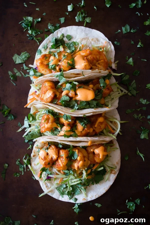 Dinner in 30: 24 Quick and Easy Meals 26 Spicy and zesty Chipotle Shrimp Tacos, garnished with fresh cilantro