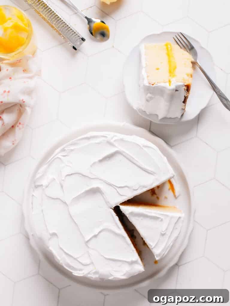 Zesty Lemon Curd Delight 3 A tempting slice of lemon curd cake, perfectly plated with a fork, highlighting the distinct layers of moist cake, tangy curd, and airy frosting.