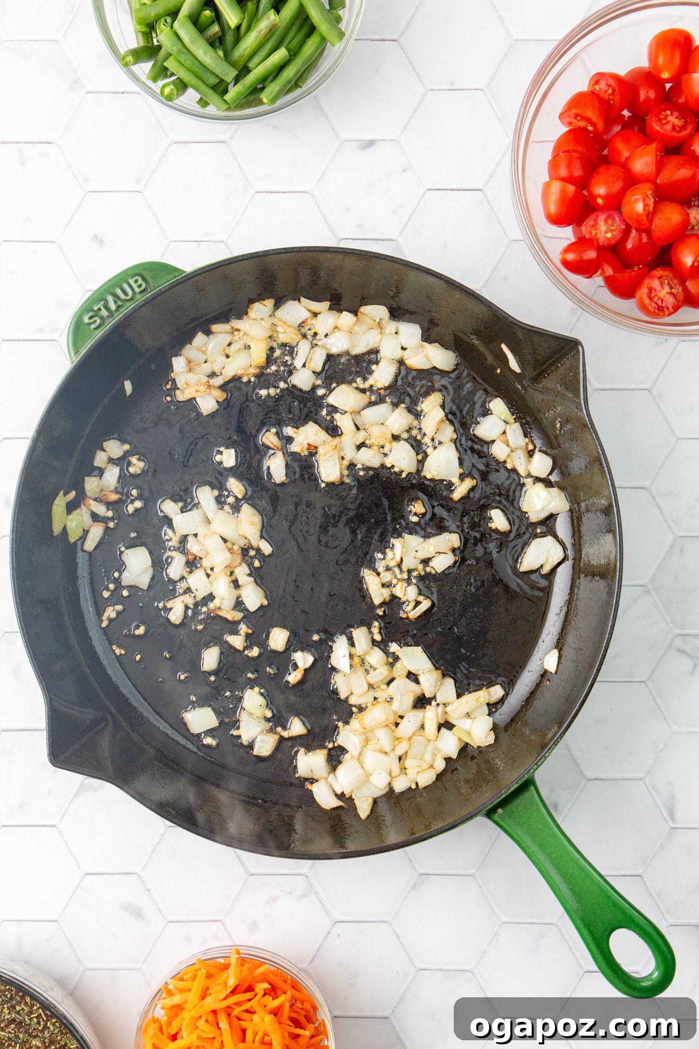 Effortless Balsamic Chicken 8 Diced onions being sautéed in a skillet, turning translucent and fragrant