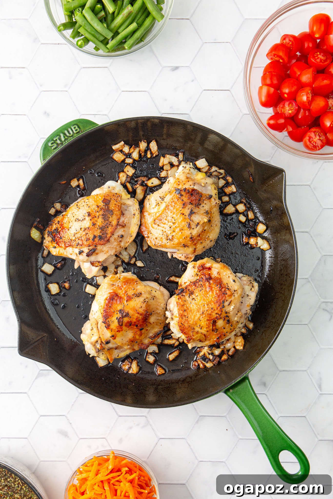 Effortless Balsamic Chicken 9 Chicken thighs searing in a skillet with green beans, developing a golden-brown crust