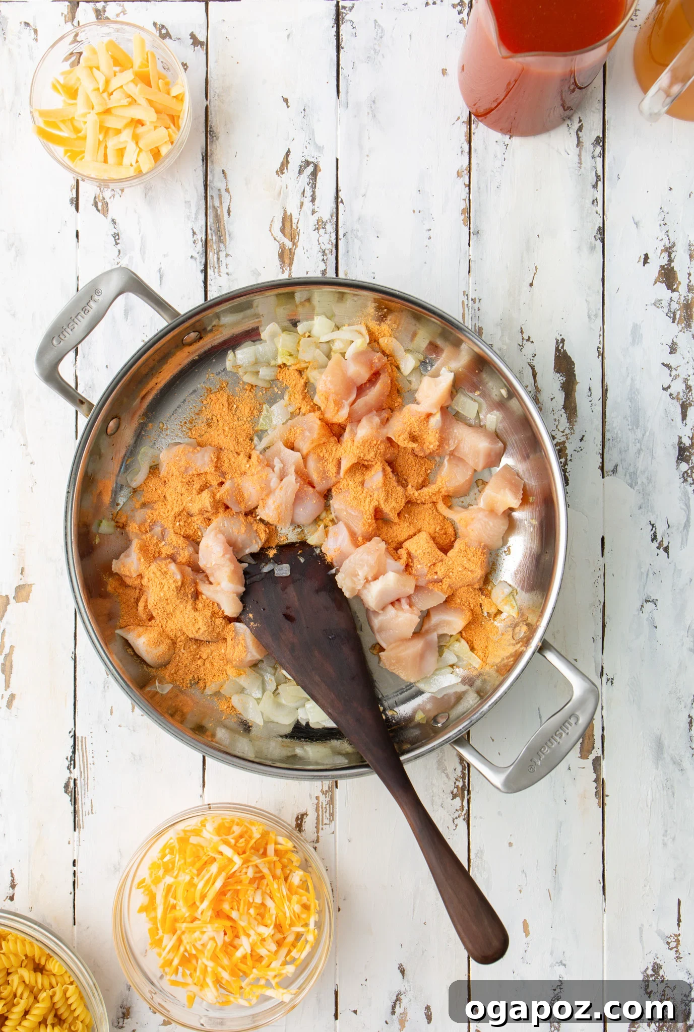 One-Pan Enchilada Chicken Pasta 5 One Pot Chicken Enchilada Pasta chicken in a skillet