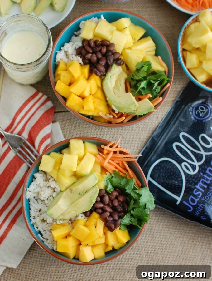 Tropical Coconut Rice Bliss 5 Top-down view of a beautifully arranged Tropical Coconut Rice Bowl, showcasing all the fresh ingredients and inviting colors.