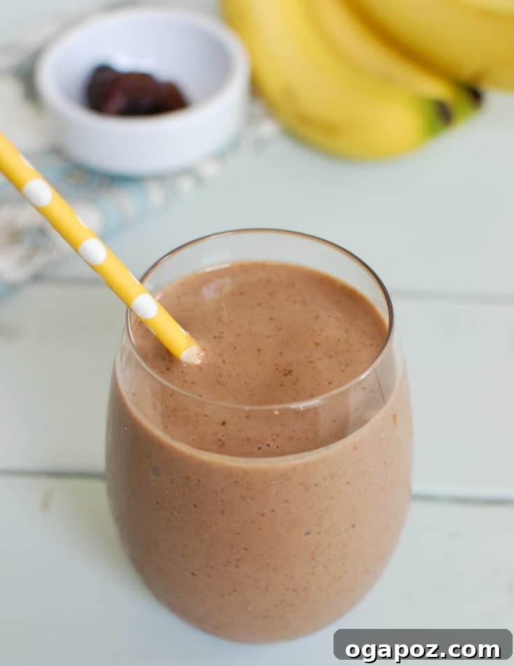 Golden Banana Date Delight 3 Close-up of a Banana Date Smoothie, highlighting its creamy texture and rich color, promising a satisfying and healthy drink.