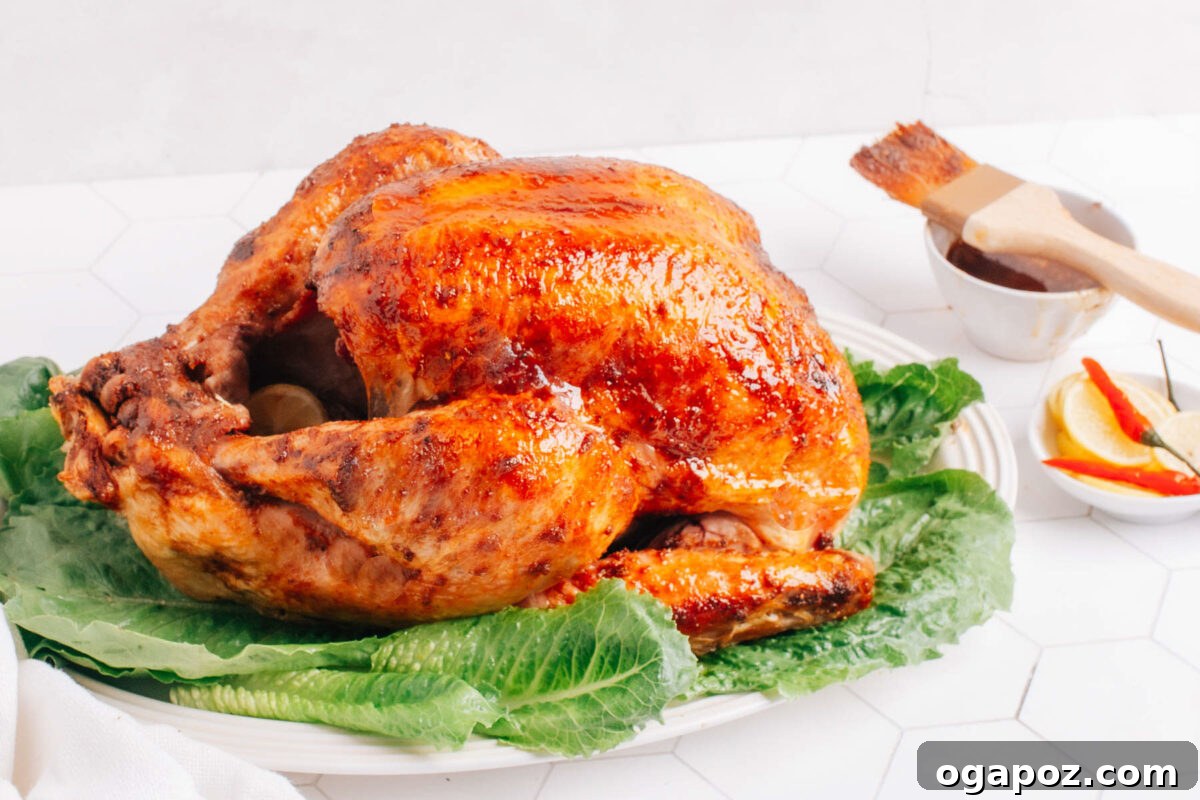 A perfectly roasted turkey on a cutting board, ready for carving.