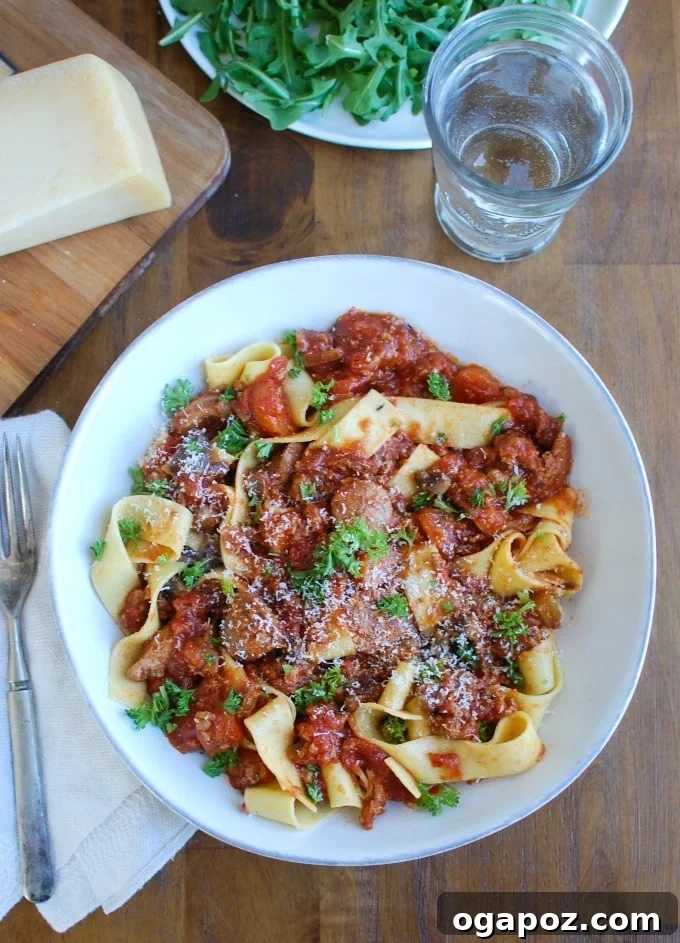 Slow-Cooked Turkey Sausage Bolognese 5 Hearty Slow Cooker Turkey Sausage Bolognese Sauce served with pasta