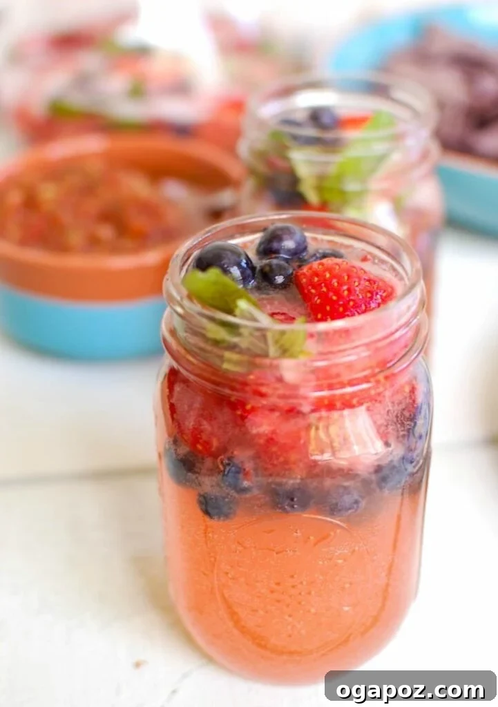 Blush Berry Lemonade Spritz 2 Vibrant Strawberry Blueberry Lemonade Spritzer, a perfect summer drink recipe