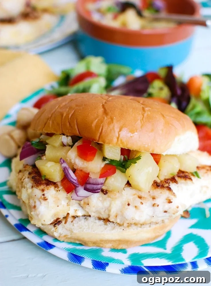 Close-up of golden Macadamia Coconut Crusted Chicken, perfectly pan-fried and ready to be enjoyed.