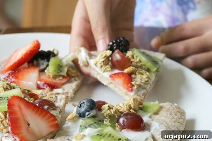 32 Delicious Wholesome Recipes Kids Will Adore 27 No Bake Fruit Pizzas, colorful and healthy fruit pizzas for a fun snack or dessert.