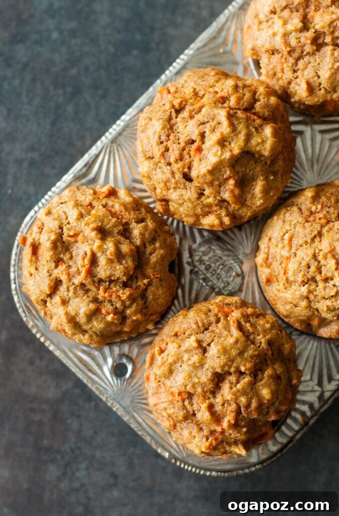 32 Delicious Wholesome Recipes Kids Will Adore 3 Butternut Carrot Whole Grain Muffins, moist and flavorful muffins with hidden vegetables.