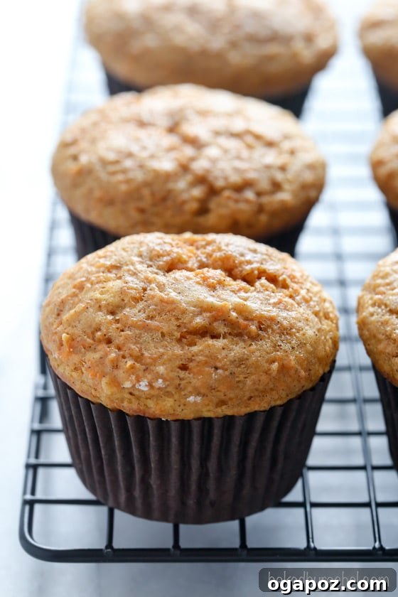 32 Delicious Wholesome Recipes Kids Will Adore 6 Applesauce Carrot Cake Muffins, a moist and flavorful muffin recipe with a healthy twist.