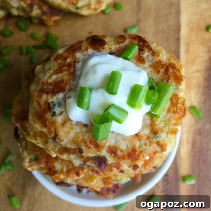 32 Delicious Wholesome Recipes Kids Will Adore 8 Cheesy Zucchini Fritters, crispy and delicious fritters perfect for a veggie-packed meal.