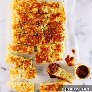 Homemade garlic bread from scratch, garnished with parsley.
