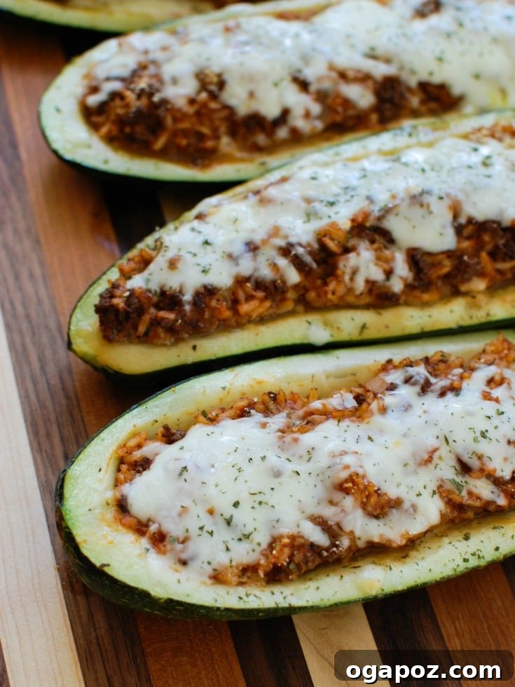 Mediterranean Zucchini Jewels 2 Mediterranean Zucchini Boats, a summer delight, stuffed with seasoned ground beef and lamb, rice, tomato sauce, cumin, and cinnamon, finished with cheese and fresh parsley.